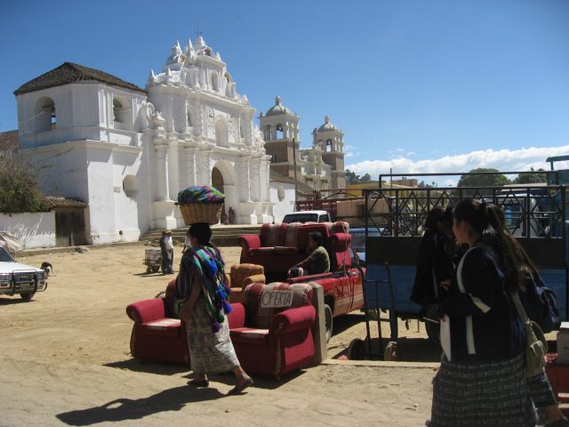In 2009, showing the facade of the old Comalapa Catholic church rebuilt and a new church beside it.