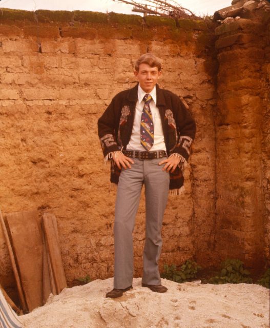 Elder Richman wearing typical Guatemalan coat, tie, and pants